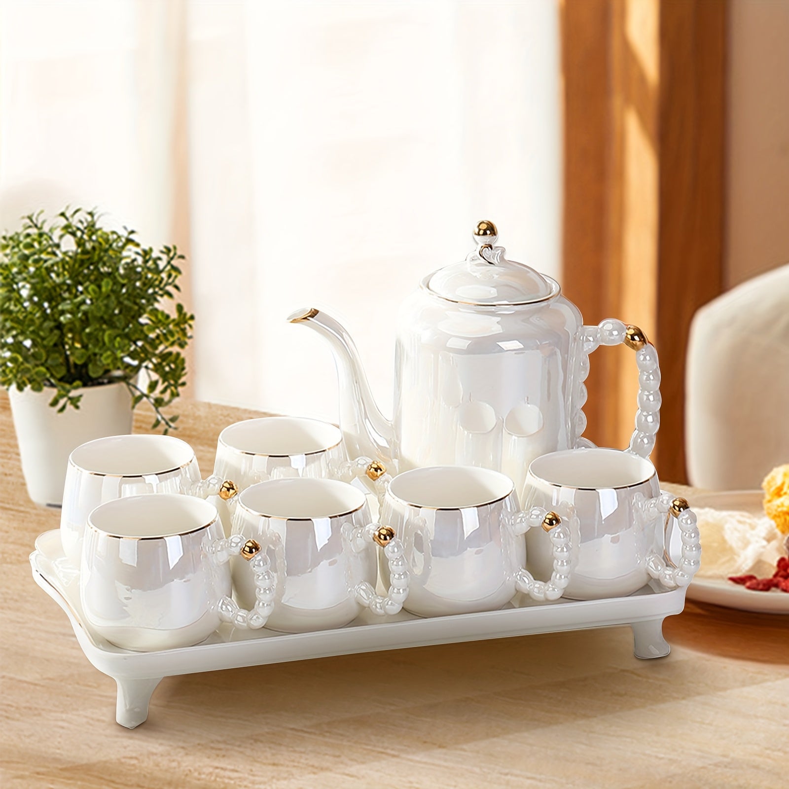 Full Porcelain Tea Service for Adults, Featuring a Pearl Handle Design, Includes 1 Covered Teapot, 6 Tea Cups, 1 Tea Tray, And Is Presented As a Tea Gift Set in White Pearl Color